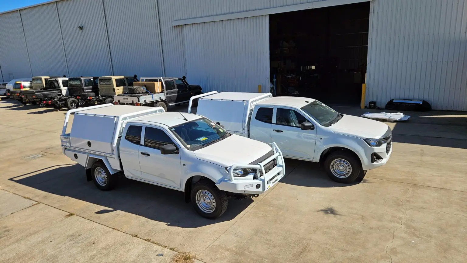 Fleet of Two White D-Max,The Edge tray and canopy package