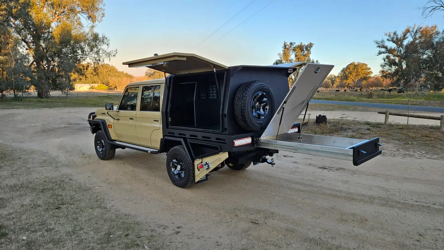 Sandy Taupe Dual Cab Landcruiser with tray and canopy